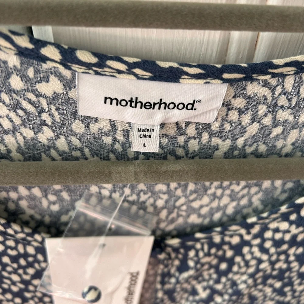 Motherhood Navy and White Patterned Blouse with Bell Sleeves and Flounce Bottom - Picture 3 of 6